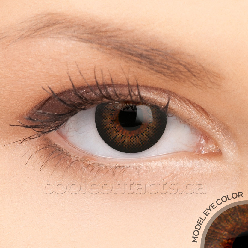 Black contact lens shown over a brown eye