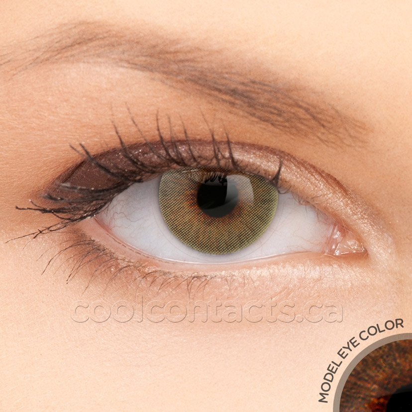 Ivory contact lens shown over a brown eye