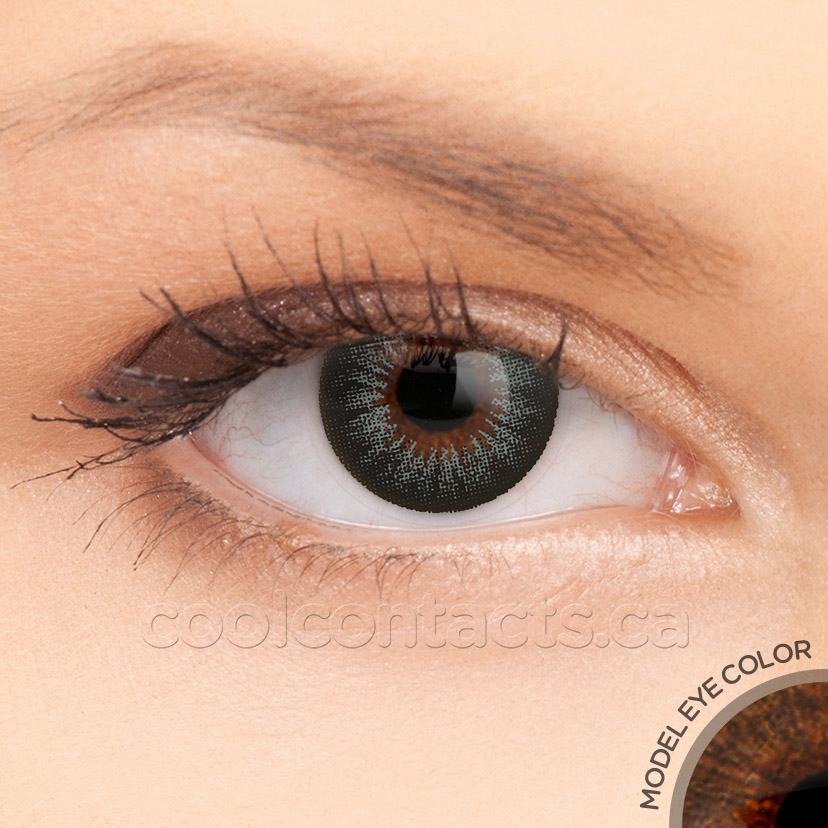 Ebony contact lens shown over a brown eye